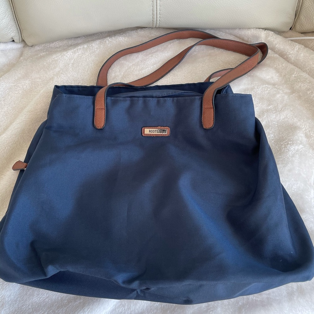 Iike new roots shoulder bag